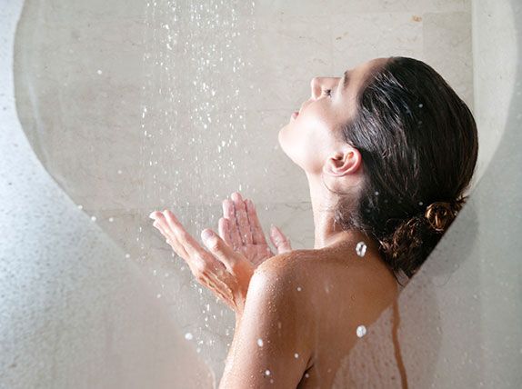 Person having a hot shower